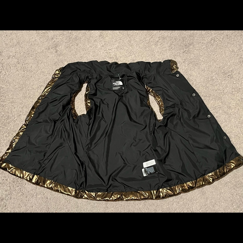 The North Face Hollidown Urban Explorer winter puffer vest women metallic copper - Picture 3 of 13